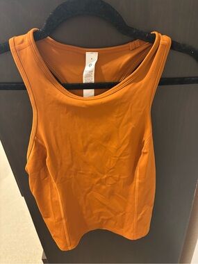 NWT Lululemon Nulux Racerback Cropped Run Tank

Butternut (Orange)

Size 8
